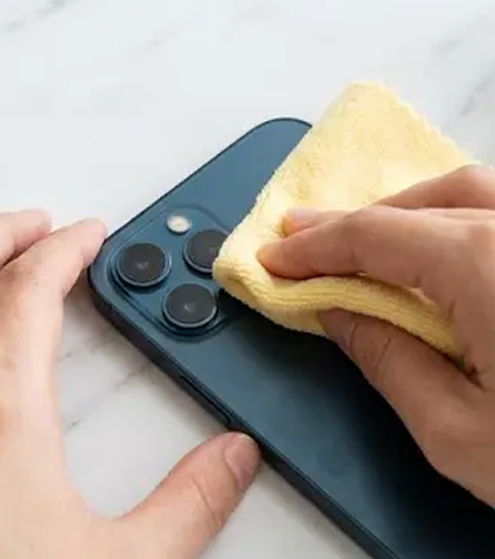 Cleaning a phone camera lens before repair